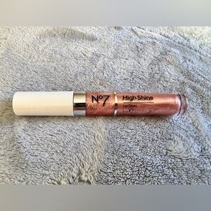Boots Shimmering Lip Gloss in Peachy Pink
